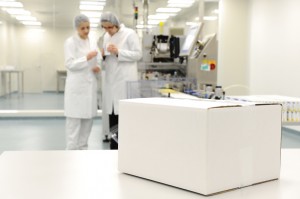 White box at automated production line at modern factory - ready for your logo